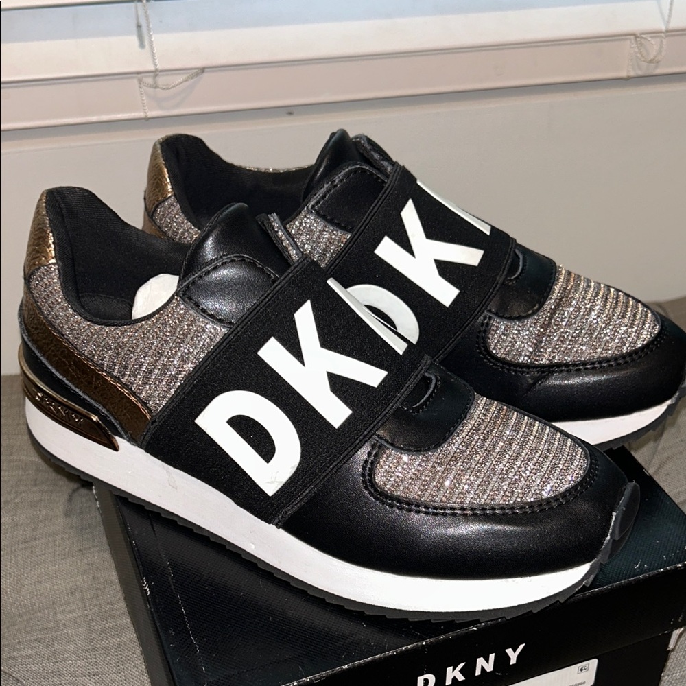 DKNY Black and Gold Sneakers with Sporty Glamour